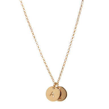 two Gold Tiny Initial Disc Coin pendants hanging from gold chain necklace - Blooming Lotus Jewelry