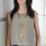 Citrine Carnelian mala beads necklace on model with large yellow jade focal stone