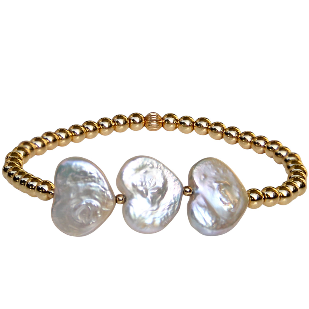 Me Myself and I Bracelet with three heart-shaped freshwater pearls with gold beads, handcrafted by Blooming Lotus Jewelry