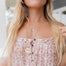 Model wearing 3 gold layering necklace with personalized pendants