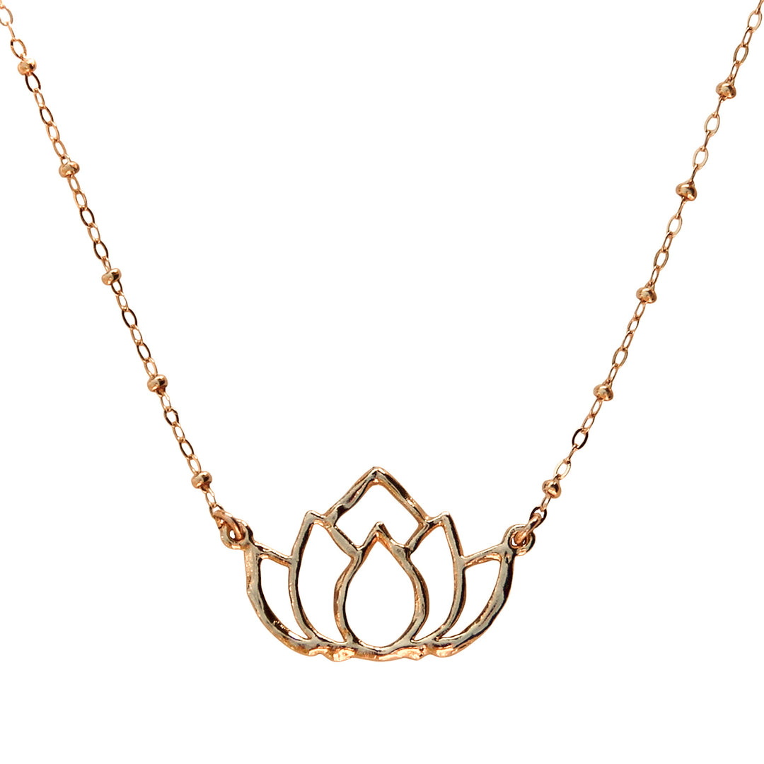Gold lotus flower necklace with a delicate beaded satellite chain, symbolizing growth and new beginnings. Handcrafted by Blooming Lotus Jewelry.