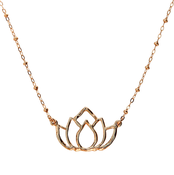 Gold lotus flower necklace with a delicate beaded satellite chain, symbolizing growth and new beginnings. Handcrafted by Blooming Lotus Jewelry.
