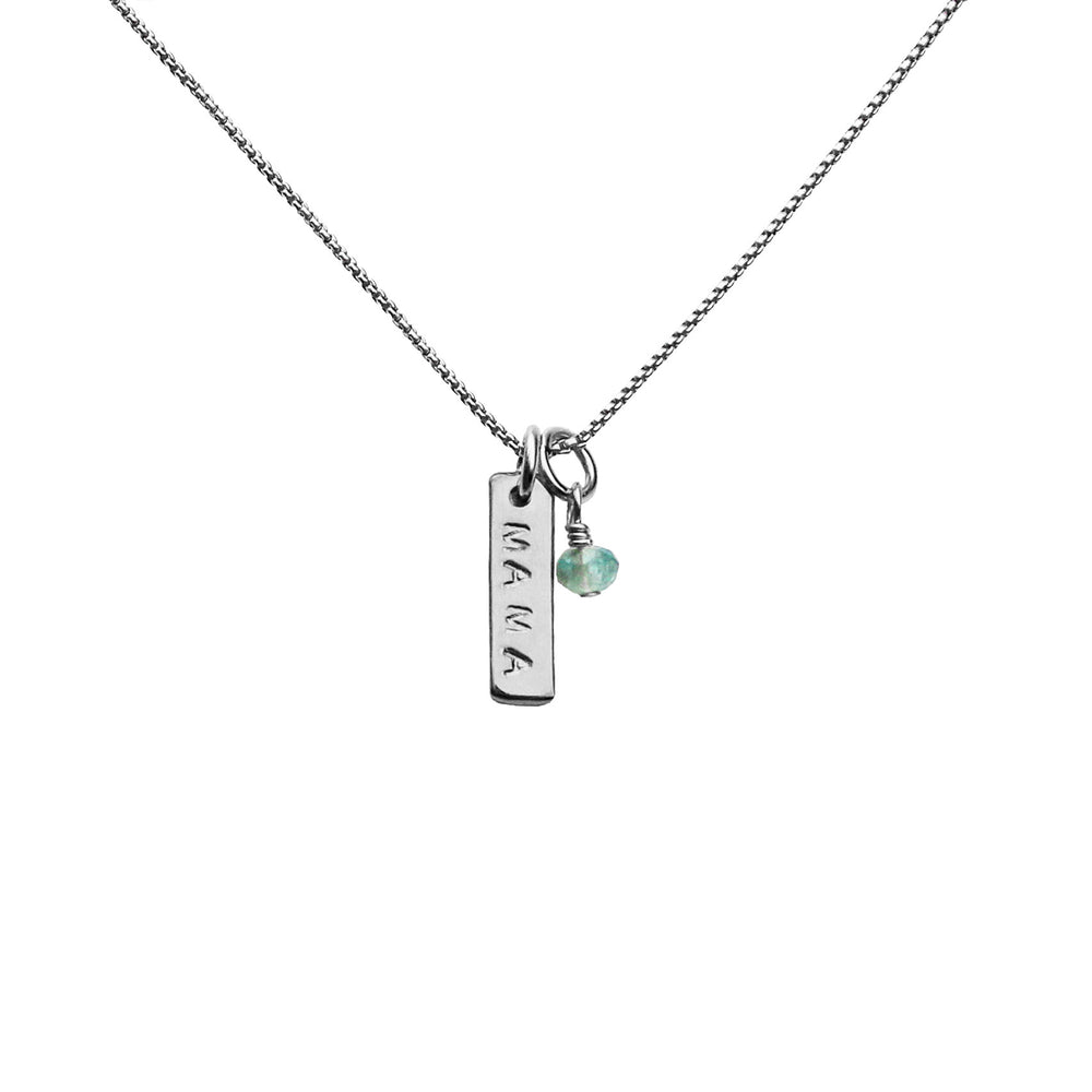 Silver Micro Bar necklace stamped with “MAMA” and paired with a tiny aquamarine gemstone charm on a delicate chain — minimalist personalized jewelry by Blooming Lotus Jewelry.