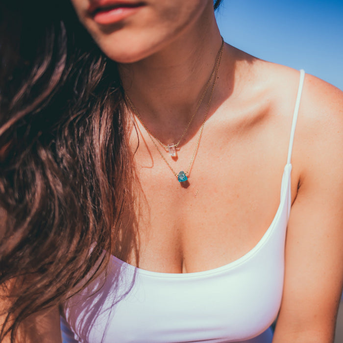 Apatite Nugget Necklace 18 inches and Clear Quartz Necklaces 16 inches on gold chain on model in white tank top - Blooming Lotus Jewelry