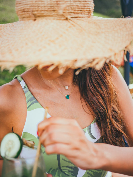 Apatite Nugget Necklace 18 inches and Clear Quartz Necklaces 16 inches on gold chain on model in straw hat - Blooming Lotus Jewelry