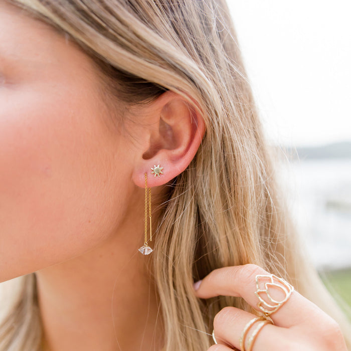 Gold Sun Stud Earring and Herkimer Diamond threader earring in models ear - Blooming Lotus Jewelry