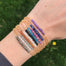 Gemstone Balance Bar Layering bracelets on wrist close up - Blooming Lotus Jewelry