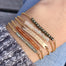 Gemstone Balance Bar Bracelets with hand-stamped grateful bar bracelet - gold chain on wrist close up - Blooming Lotus Jewelry
