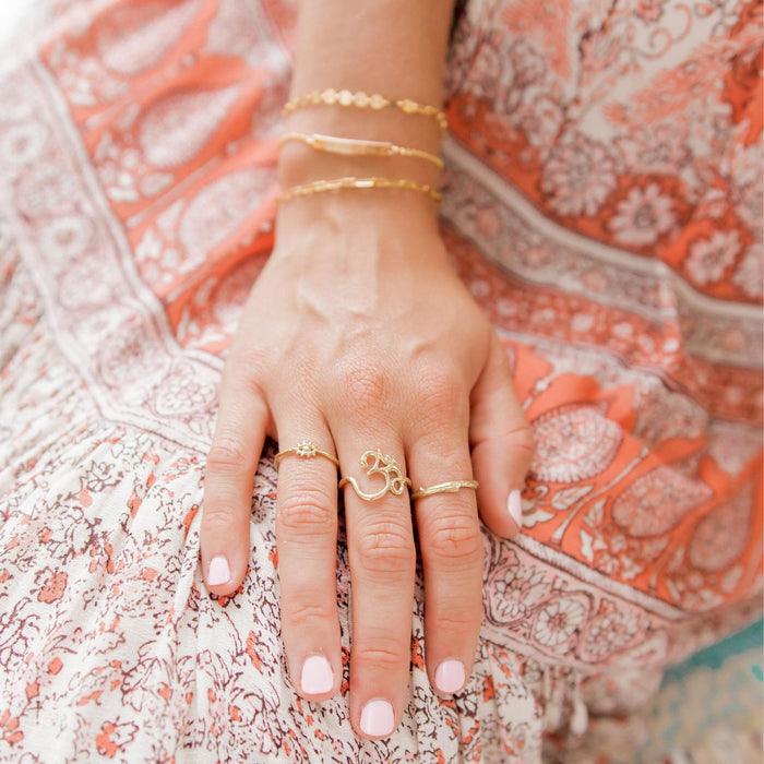 Gold Rings on model - evil eye - Om - Branch Twig - Blooming Lotus Jewelry
