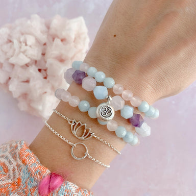 Karma circle and lotus chain bracelets Om gemstone bracelet on wrist - Blooming Lotus Jewelry