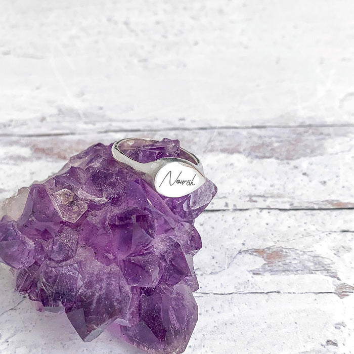 Mantra Signet Ring personalized engraved with Nourish on amethyst crystal - Blooming Lotus Jewelry