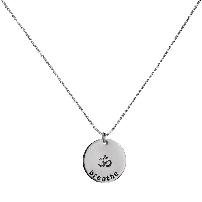 Mini Mantra Coin stamped with Breathe and Om symbol - silver - Blooming Lotus Jewelry