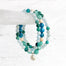Ocean Inspired gemstone bracelets with silver shell charm hanging on selenite gemstone - Blooming Lotus Jewelry