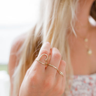 Open Heart Ring and stacking gold rings on model - Blooming Lotus Jewelry
