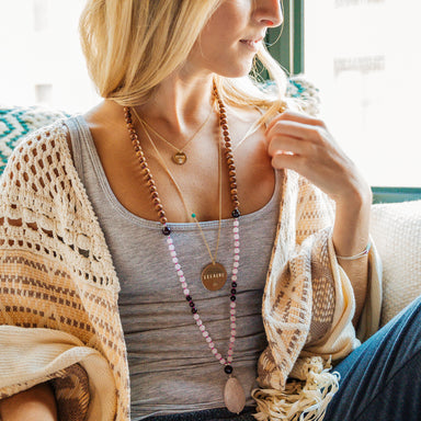 boho mala beads gold layering necklaces on model - blooming lotus jewelry