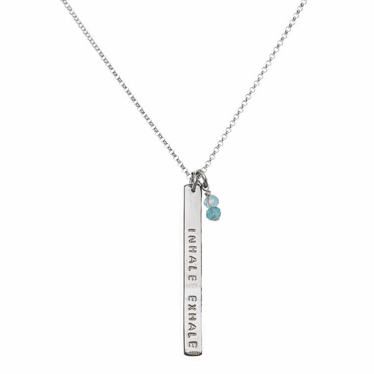 Sterling silver personalized bar necklace stamped with “INHALE EXHALE,” paired with aquamarine gemstone charms on a chain — Skinny Mantra Bar Necklace by Blooming Lotus Jewelry.